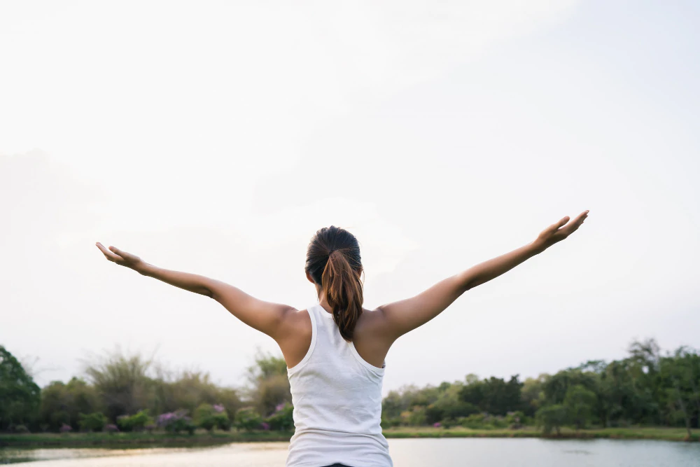 healthy-young-asian-runner-woman-warm-up-the-body-stretching-before-exercise-and-yoga